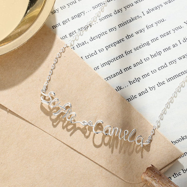 .925 Sterling Silver Double Names Necklace in a wire font with 14K White Gold Plating